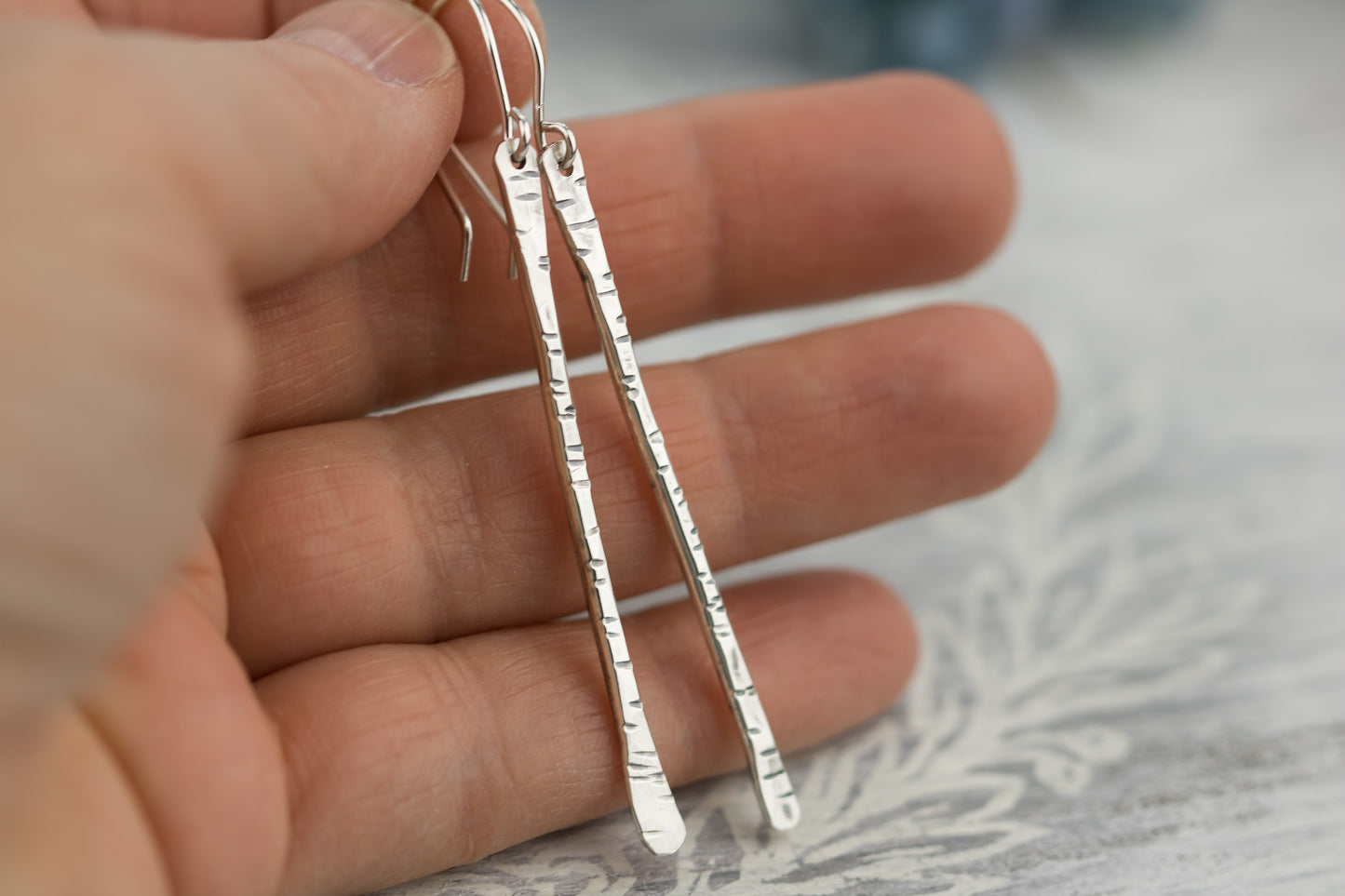 Sterling silver twig earrings2.75" long with hammered birchbark texture.