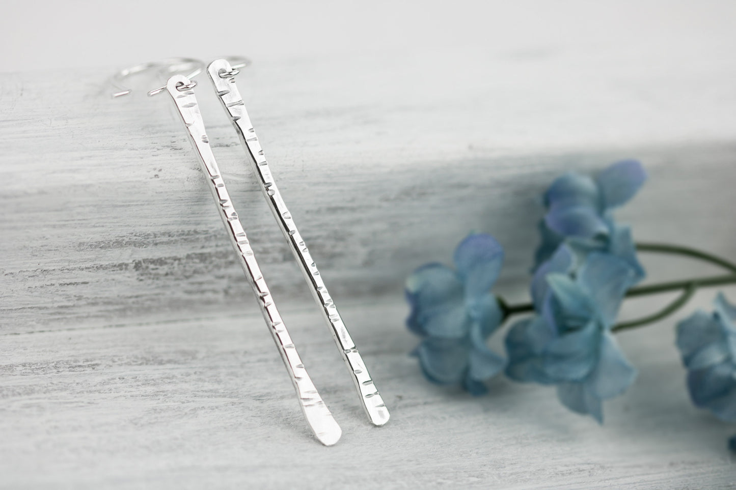 Sterling silver twig earrings2.75" long with hammered birchbark texture.