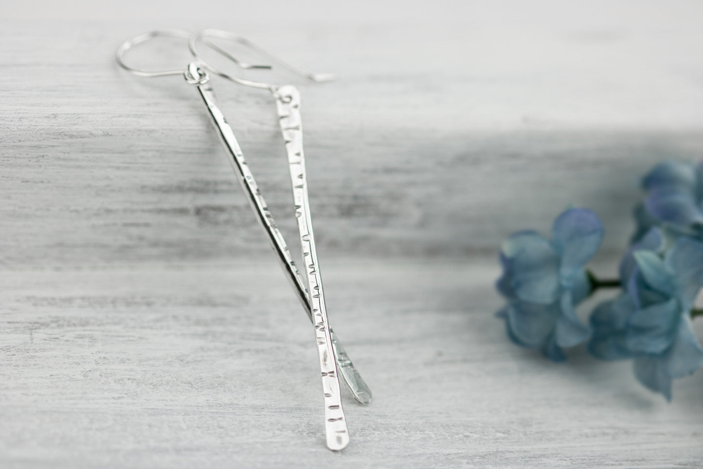 Sterling silver twig earrings2.75" long with hammered birchbark texture.