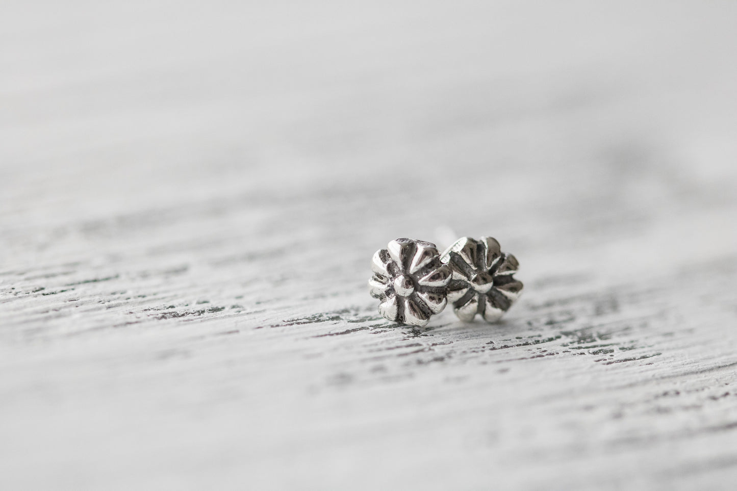 Sterling silver stud earrings.