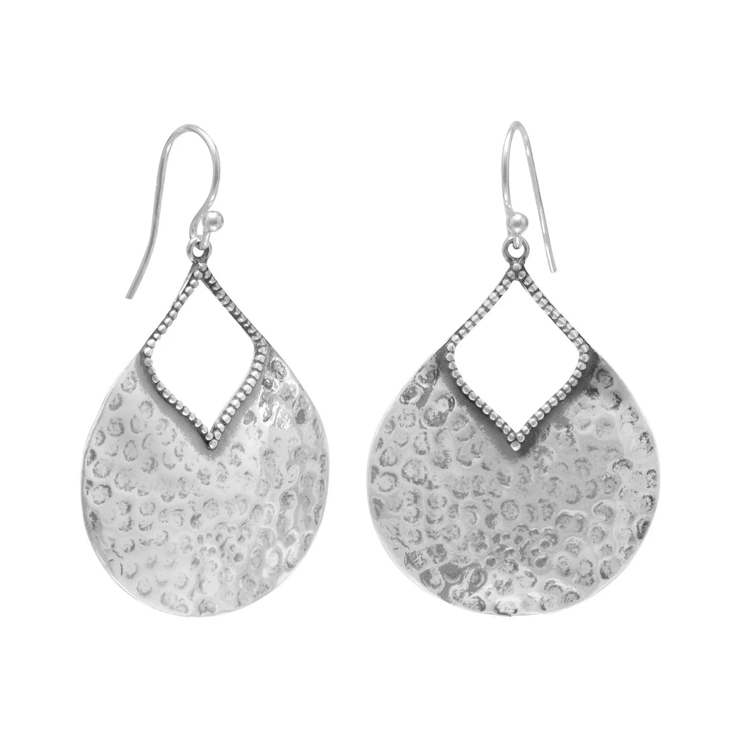 Pair of silver earrings with textured pear shaped  designs on a white background