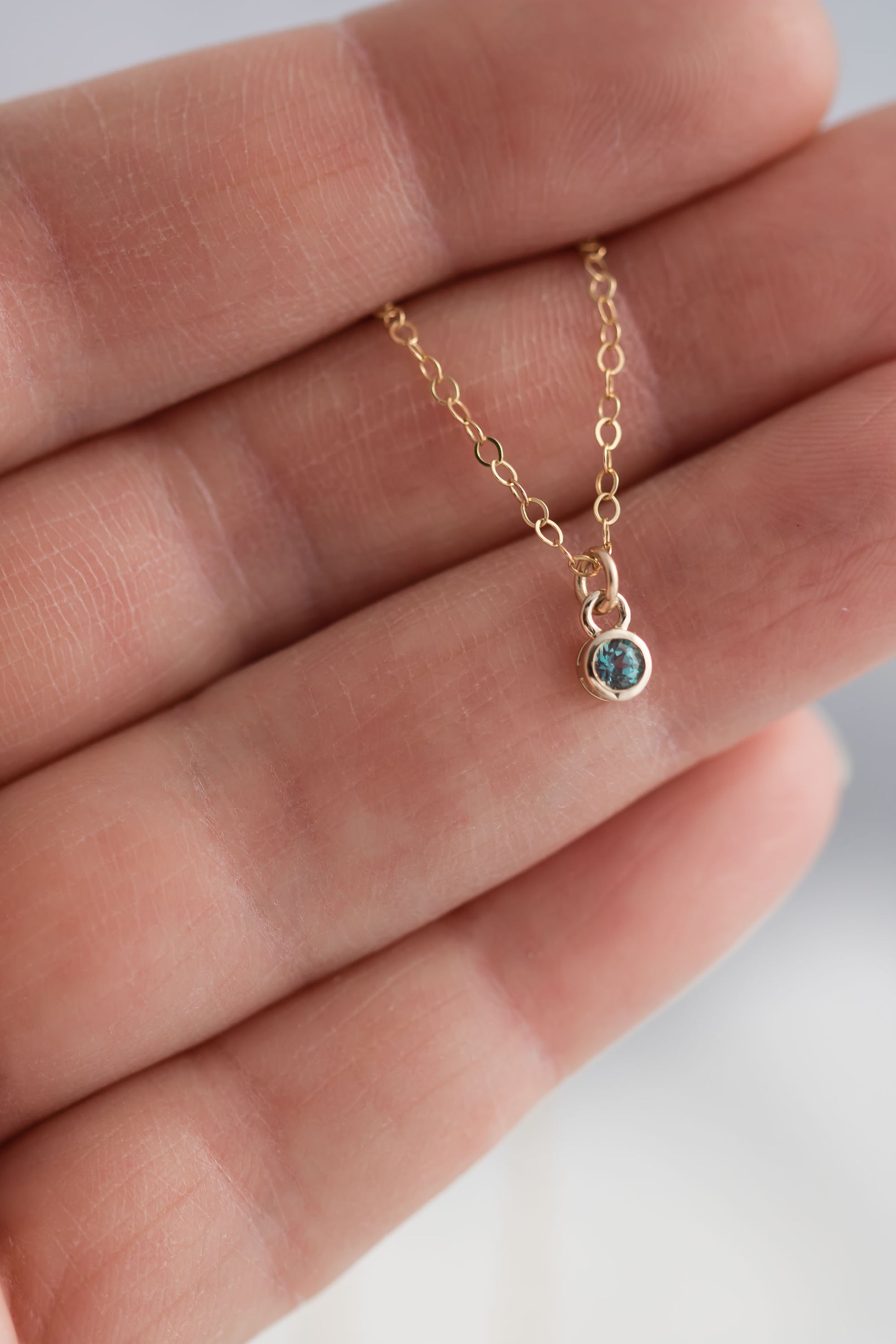 Solid yellow 14k Gold birthstone charms on solid yellow gold  chain.