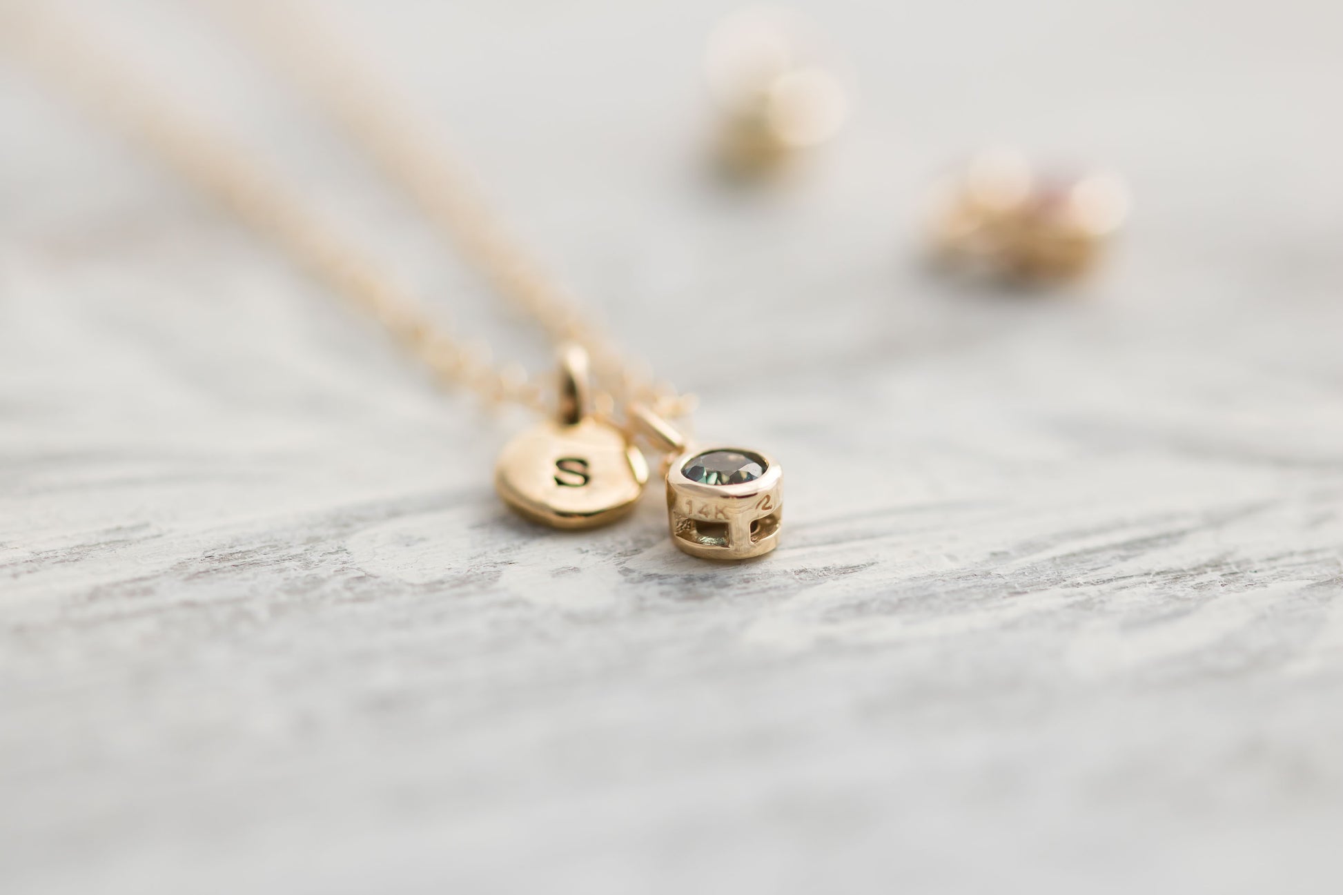 Solid yellow 14k Gold birthstone charms on solid yellow gold  chain.