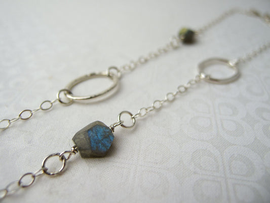 Long 35 inch sterling silver and labradorite necklace with hand made silver circle links and faceted labradorite nuggets.