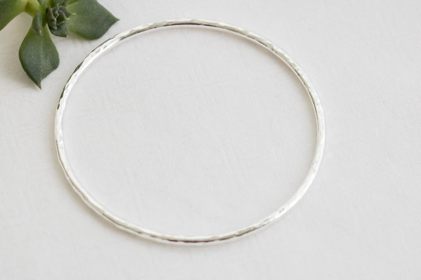 14 Gauge fine silver hammered texture bangle stacking bracelet.