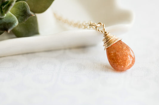 Sunstone pear-shaped briolette wire wrapped in 14 karat gold filled wire necklace on a gold filled chain