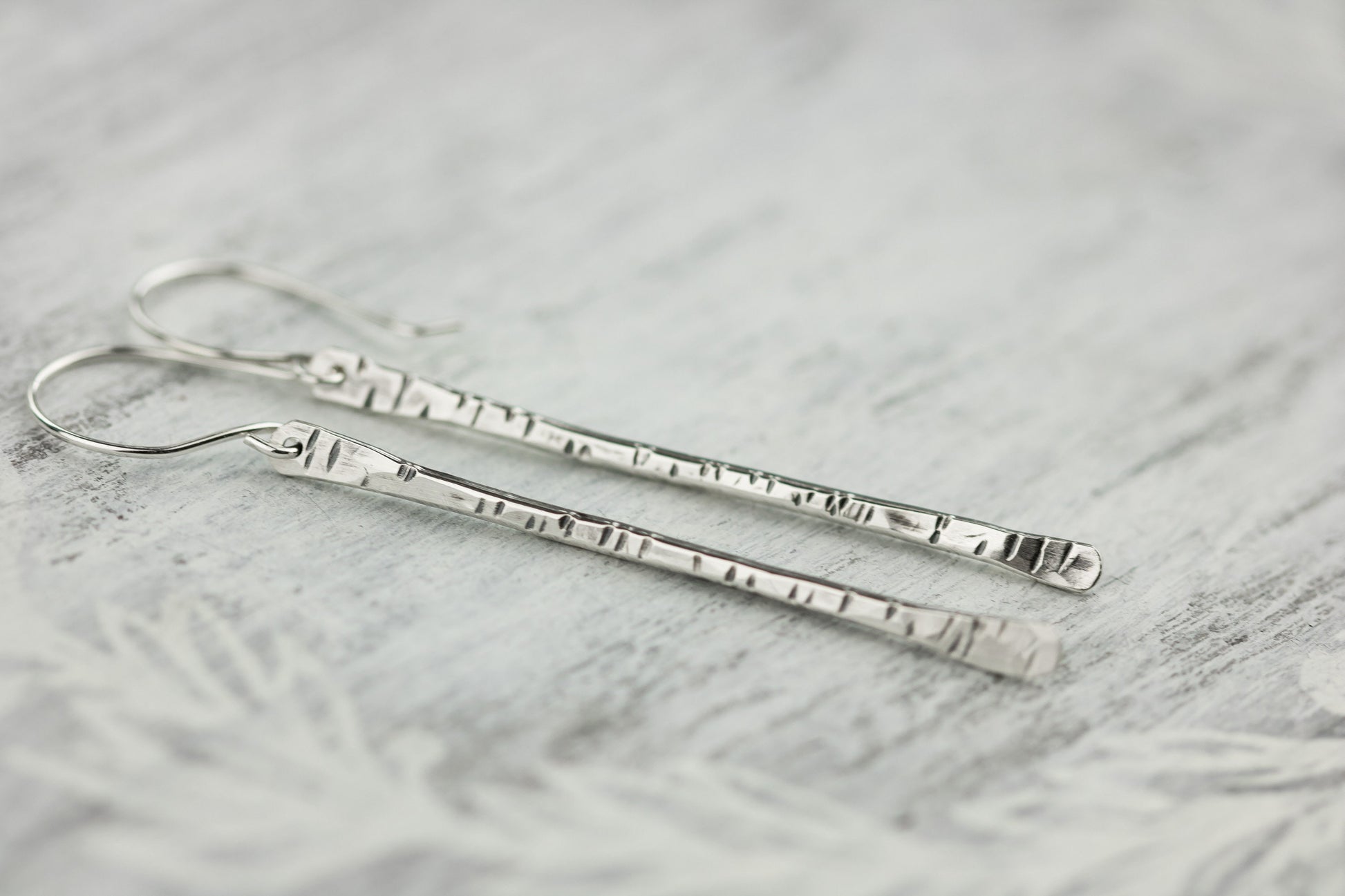 Sterling silver twig earrings2.75" long with hammered birchbark texture.