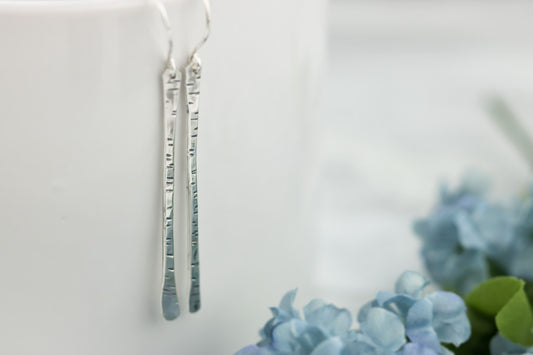 Sterling silver twig earrings2.75" long with hammered birchbark texture.