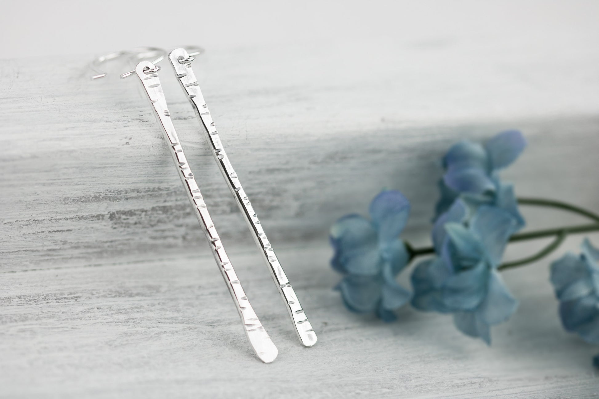 Sterling silver twig earrings2.75" long with hammered birchbark texture.