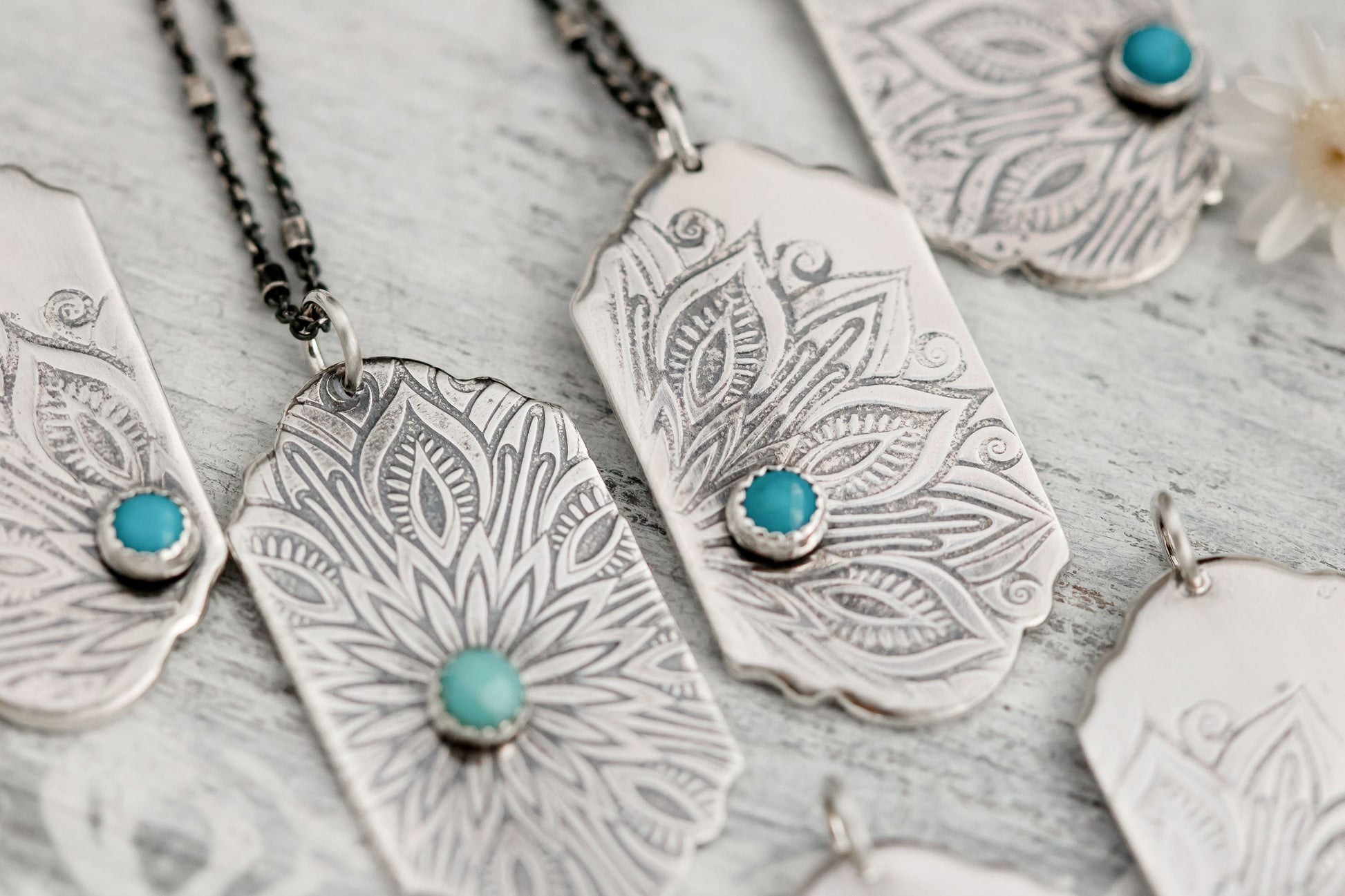 Sterling silver tag necklace with mandala design and a genuine turquoise cabochon. 