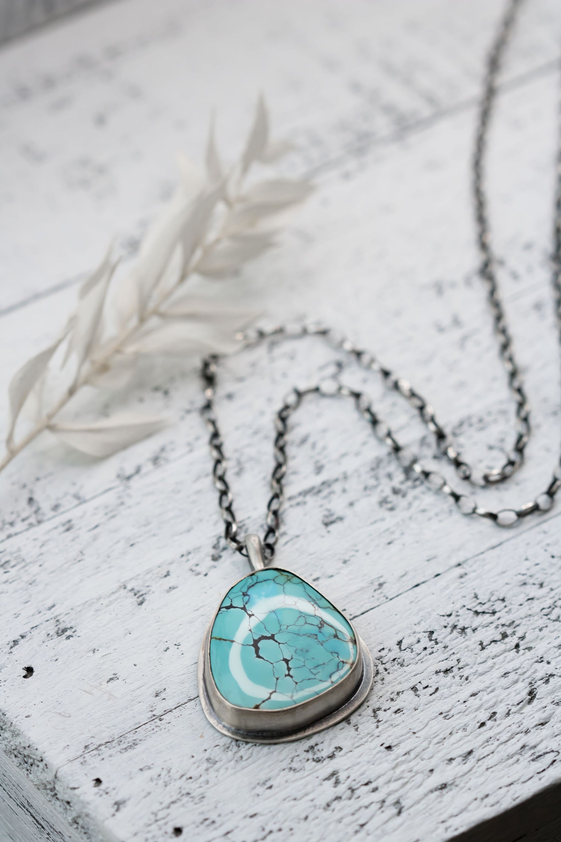 Large Sterling Silver and Genuine Hubei Turquoise with Spiderweb Matrix Necklace on a sterling silver oval chain.