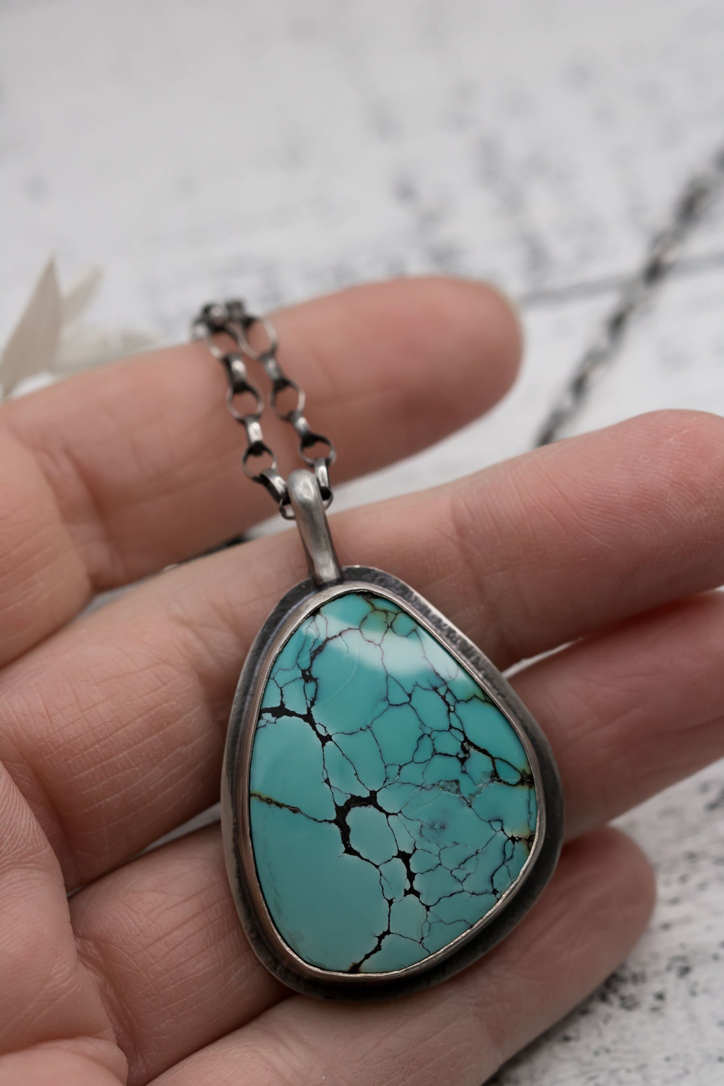 Large Sterling Silver and Genuine Hubei Turquoise with Spiderweb Matrix Necklace on a sterling silver oval chain.