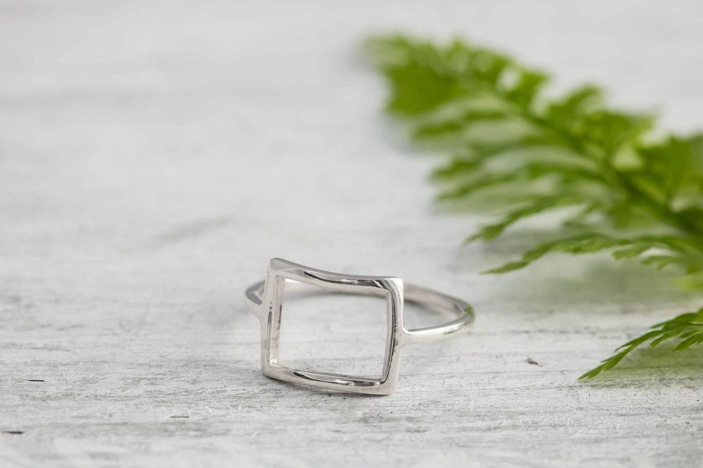 Sterling silver open square modern ring.